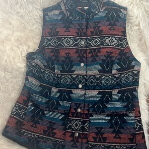 This is an Aztec woman vest! It is a size medium Ruff Hewn.